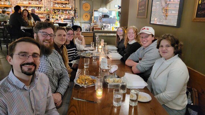 Christopher Ainley and NAG students at dinner